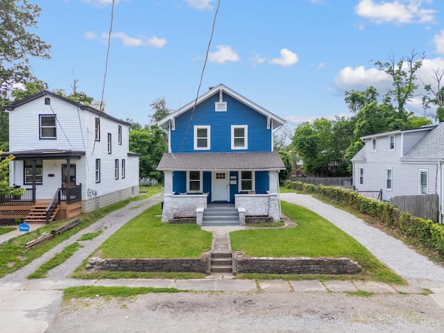 6213 Coleridge Ave, Cincinnati, OH 45213 - american foursquare style home featuring a porch and driveway