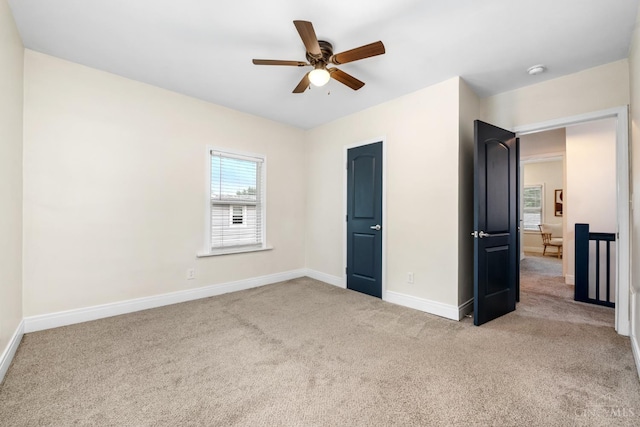6213 Coleridge Ave, Cincinnati, OH 45213 - unfurnished bedroom featuring carpet floors and a ceiling fan