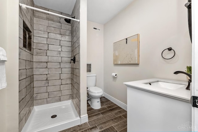 6213 Coleridge Ave, Cincinnati, OH 45213 - full bathroom with vanity, wood finish floors, and tiled shower