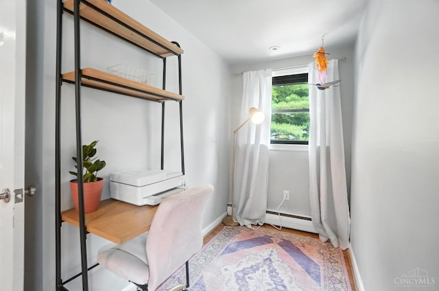 3862 Settle Rd, Mariemont, OH 45227 - office space featuring a baseboard heating unit and wood finished floors