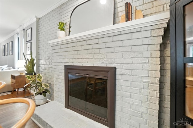 3862 Settle Rd, Mariemont, OH 45227 - detailed view of ornamental molding, a fireplace, and brick wall