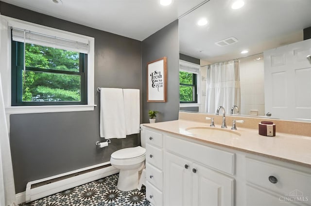 3862 Settle Rd, Mariemont, OH 45227 - full bathroom with a baseboard radiator, vanity, recessed lighting, and curtained shower