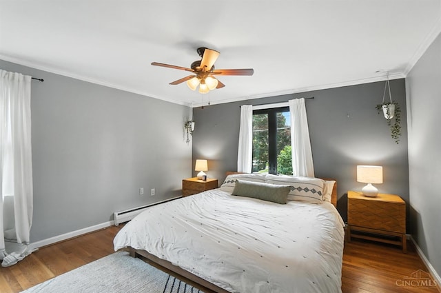 3862 Settle Rd, Mariemont, OH 45227 - bedroom with a baseboard heating unit, crown molding, wood finished floors, and a ceiling fan