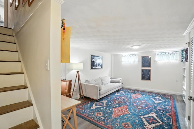 3862 Settle Rd, Mariemont, OH 45227 - living area featuring stairway and wood finished floors
