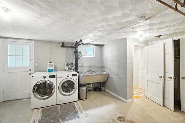 3862 Settle Rd, Mariemont, OH 45227 - laundry area featuring washer and dryer and concrete block wall