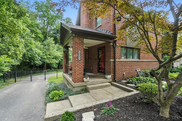 6159 Tulane Rd, Cincinnati, OH 45212 - doorway to property featuring brick siding