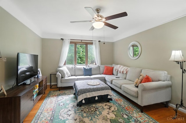 6159 Tulane Rd, Cincinnati, OH 45212 - living area with a ceiling fan and light wood-style flooring