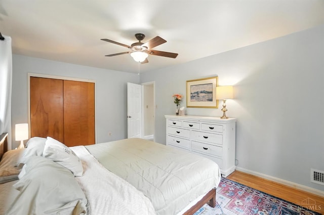 6159 Tulane Rd, Cincinnati, OH 45212 - bedroom featuring light wood-type flooring, a closet, and ceiling fan