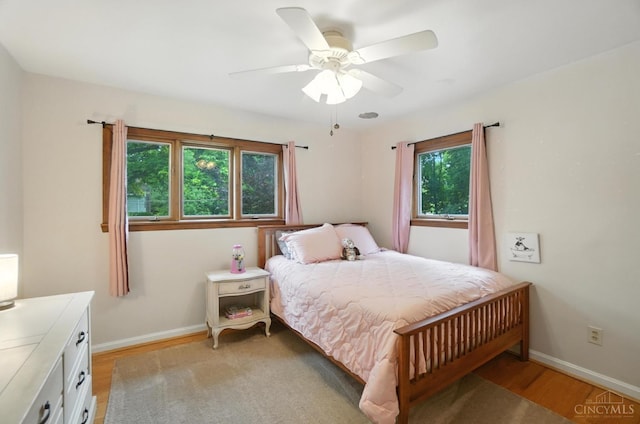 6159 Tulane Rd, Cincinnati, OH 45212 - bedroom featuring light wood finished floors and ceiling fan