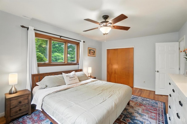 6159 Tulane Rd, Cincinnati, OH 45212 - bedroom featuring light wood-style flooring, a closet, and a ceiling fan
