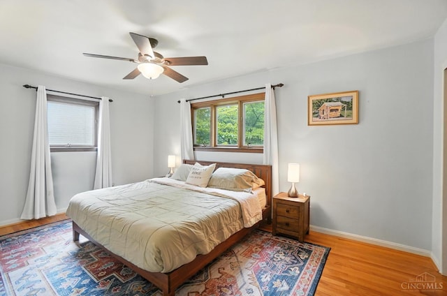 6159 Tulane Rd, Cincinnati, OH 45212 - bedroom with light wood-style flooring and ceiling fan