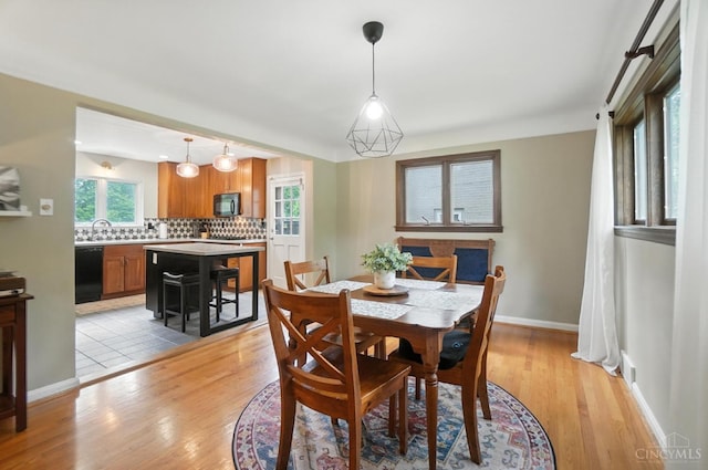 6159 Tulane Rd, Cincinnati, OH 45212 - dining room with light wood-style floors and plenty of natural light