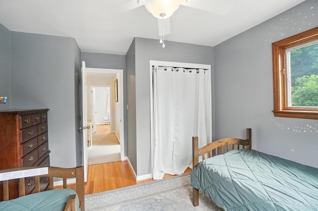 6159 Tulane Rd, Cincinnati, OH 45212 - bedroom featuring light wood-style flooring and a ceiling fan