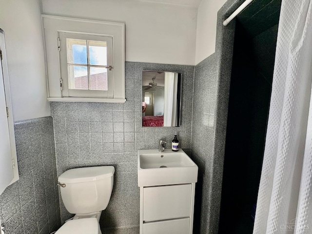 2617 Milton Rd, Middletown, OH 45042 - bathroom with vanity, tile walls, and a shower with shower curtain