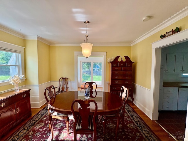 2617 Milton Rd, Middletown, OH 45042 - dining room with dark wood-style floors, crown molding, and wainscoting