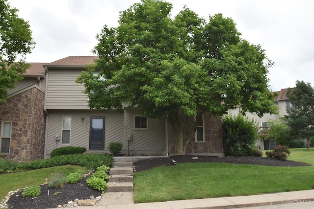 4923 Columbia Cir Unit 139, West Chester, OH 45011 - view of front of house with stone siding and a front lawn