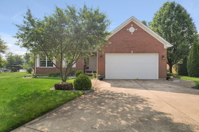 440 Waynoka Dr, Franklin Twp, OH 45171 - view of front of property with concrete driveway, a front yard, brick siding, and an attached garage