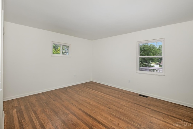 1407 Southwind Dr, Mason, OH 45040 - unfurnished room with dark wood-style flooring and baseboards