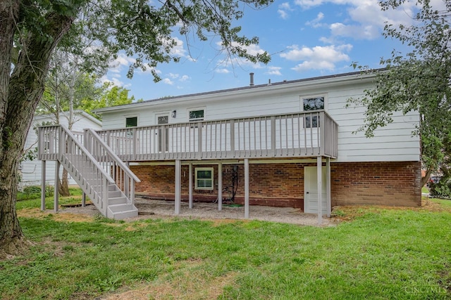 1407 Southwind Dr, Mason, OH 45040 - back of house with a wooden deck, a yard, brick siding, and stairs