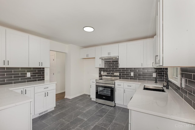 1407 Southwind Dr, Mason, OH 45040 - kitchen featuring stainless steel electric range oven, decorative backsplash, light stone countertops, white cabinets, and under cabinet range hood