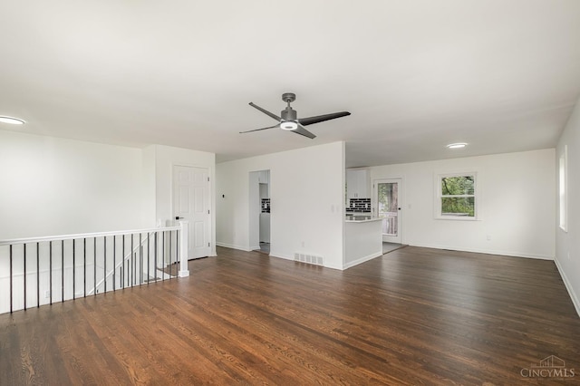 1407 Southwind Dr, Mason, OH 45040 - unfurnished living room featuring dark wood-style floors and a ceiling fan