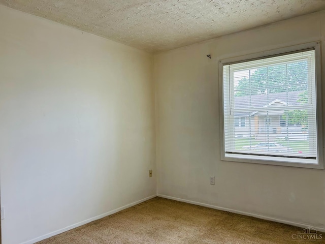 3744 Dina Ave, Cheviot, OH 45211 - unfurnished room with light carpet and a textured ceiling