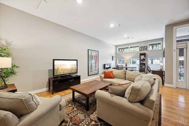 1150 Vine St Unit 15, Cincinnati, OH 45202 - living room with light wood-type flooring, recessed lighting, and a desk