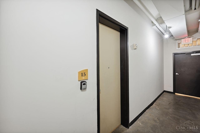 1150 Vine St Unit 15, Cincinnati, OH 45202 - hallway with concrete flooring and baseboards