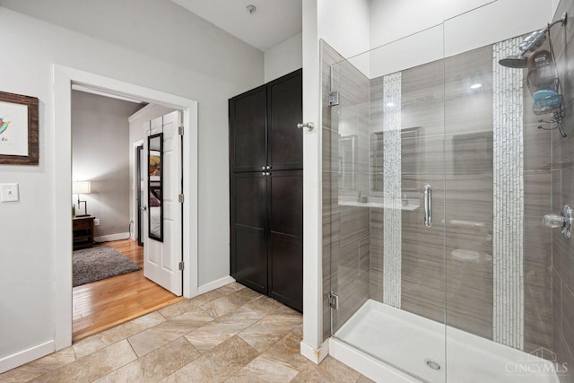 1150 Vine St Unit 15, Cincinnati, OH 45202 - full bathroom with a shower stall and baseboards