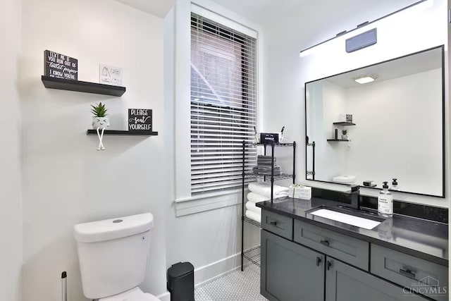 1407 Vine St Unit 203, Cincinnati, OH 45202 - half bathroom with vanity and tile patterned floors