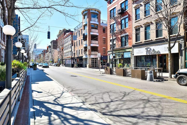 1407 Vine St Unit 203, Cincinnati, OH 45202 - view of asphalt street featuring sidewalks, street lights, and curbs