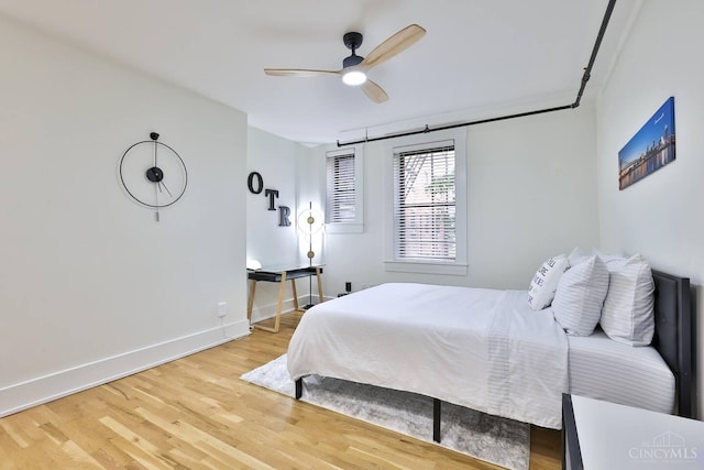 1407 Vine St Unit 203, Cincinnati, OH 45202 - bedroom with light wood-type flooring and ceiling fan