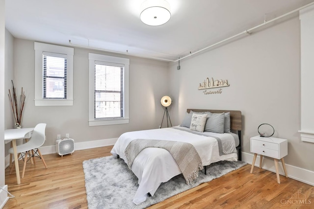 1407 Vine St Unit 303, Cincinnati, OH 45202 - bedroom with wood finished floors and baseboards