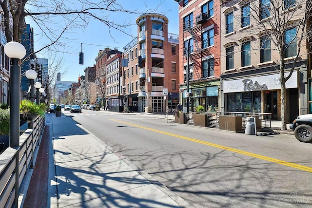 1407 Vine St Unit 303, Cincinnati, OH 45202 - view of asphalt road featuring sidewalks, street lighting, and curbs
