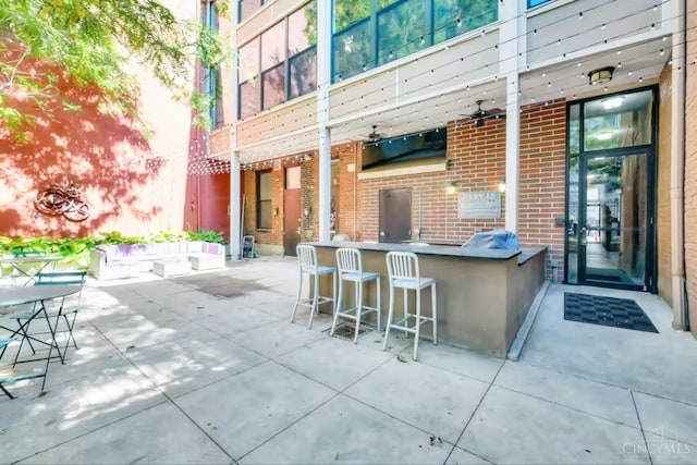 1407 Vine St Unit 303, Cincinnati, OH 45202 - view of patio with exterior bar and ceiling fan
