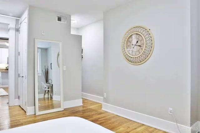 1407 Vine St Unit 303, Cincinnati, OH 45202 - bedroom with wood finished floors