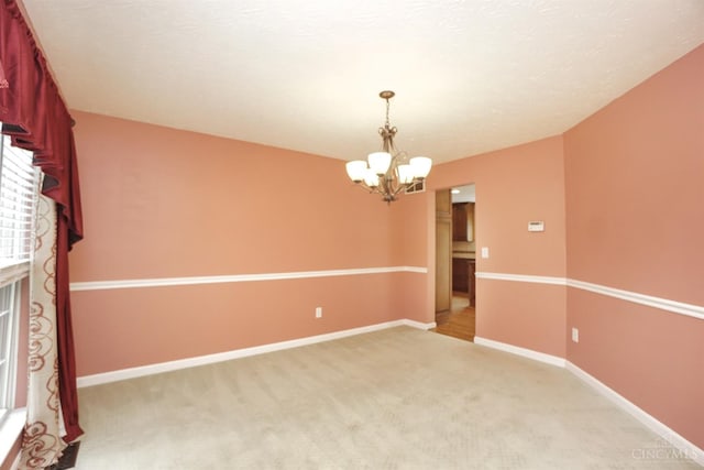 3779 Windyhollow Way, Mason, OH 45040 - empty room featuring a chandelier and light carpet
