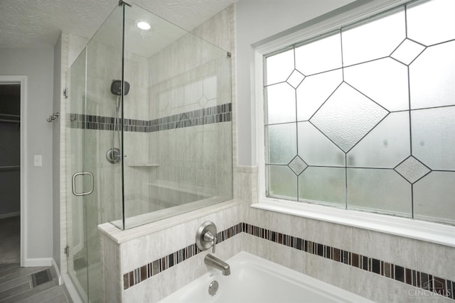 3779 Windyhollow Way, Mason, OH 45040 - bathroom featuring a shower stall, a garden tub, and recessed lighting