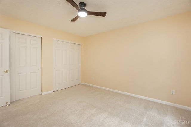 3779 Windyhollow Way, Mason, OH 45040 - unfurnished bedroom featuring light carpet, ceiling fan, and multiple closets