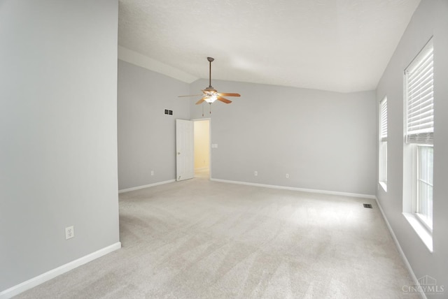 3779 Windyhollow Way, Mason, OH 45040 - unfurnished room featuring lofted ceiling, a ceiling fan, plenty of natural light, and light carpet