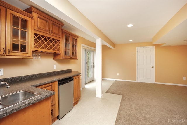 3779 Windyhollow Way, Mason, OH 45040 - kitchen featuring stainless steel dishwasher, dark countertops, brown cabinetry, glass insert cabinets, and recessed lighting