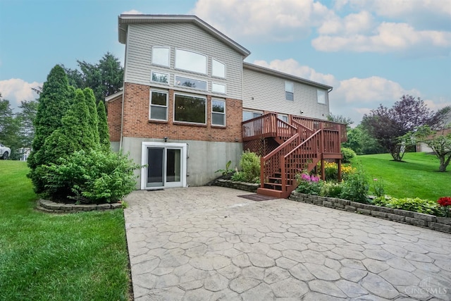3779 Windyhollow Way, Mason, OH 45040 - back of house featuring a patio area, brick siding, a lawn, a wooden deck, and stairway