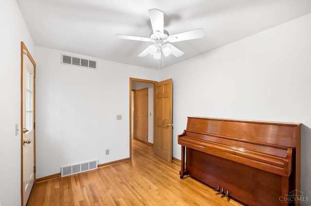 3057 Fox Den Ln, Anderson Twp, OH 45244 - bedroom with light wood finished floors and a ceiling fan