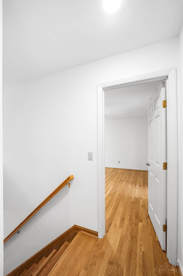 3057 Fox Den Ln, Anderson Twp, OH 45244 - hallway with light wood-type flooring and an upstairs landing
