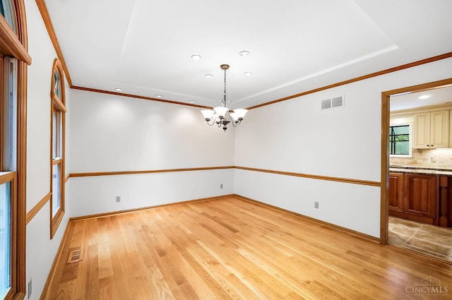 3057 Fox Den Ln, Anderson Twp, OH 45244 - unfurnished room with a chandelier, light wood-style flooring, recessed lighting, and ornamental molding