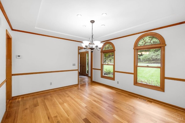 3057 Fox Den Ln, Anderson Twp, OH 45244 - unfurnished room featuring a chandelier, light wood finished floors, and ornamental molding