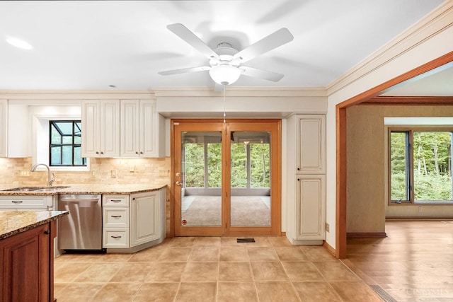 3057 Fox Den Ln, Anderson Twp, OH 45244 - kitchen with stainless steel dishwasher, light stone countertops, backsplash, crown molding, and ceiling fan