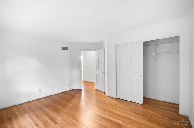 3057 Fox Den Ln, Anderson Twp, OH 45244 - unfurnished bedroom with light wood finished floors and a closet