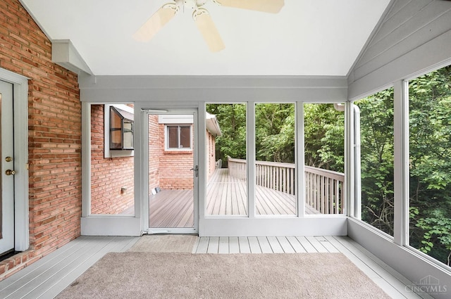 3057 Fox Den Ln, Anderson Twp, OH 45244 - unfurnished sunroom featuring vaulted ceiling, ceiling fan, and plenty of natural light
