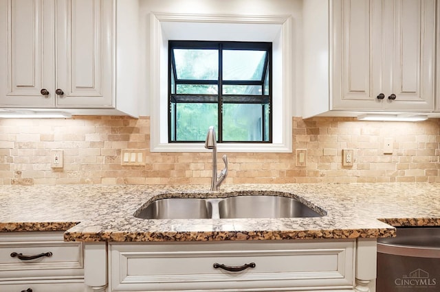 3057 Fox Den Ln, Anderson Twp, OH 45244 - kitchen featuring white cabinetry, light stone countertops, and decorative backsplash